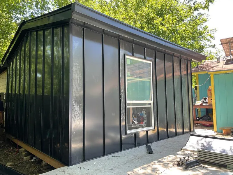 Black standing seam metal wall panels for Roof Inspection in Woodmere