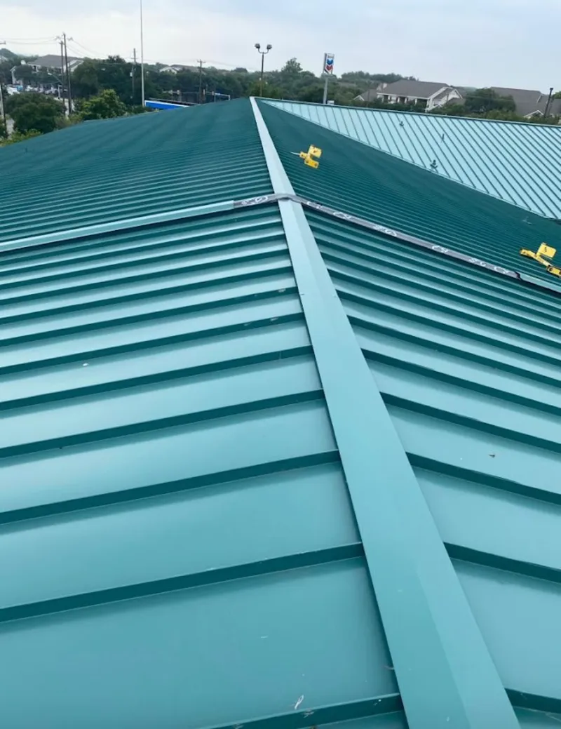 Green commercial metal roof ridge and valley for Metal Roof Repair in Woodmere