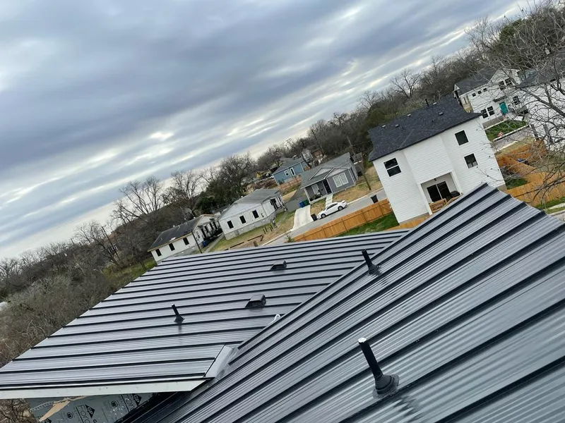 Standing seam metal roof panels with vents for Skylight Repair in Woodmere